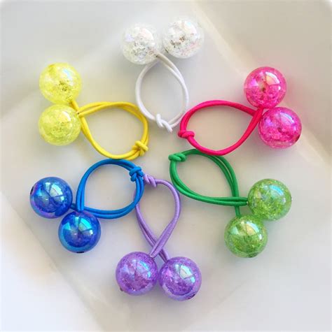 ball ponytail holder|More.